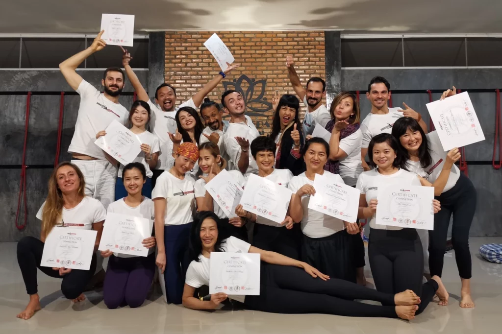 Group photo of participants in the Yoga Sadhana 300-Hour Teacher Training Course, batch 2, taken in 2019 in Chiang Rai, Thailand